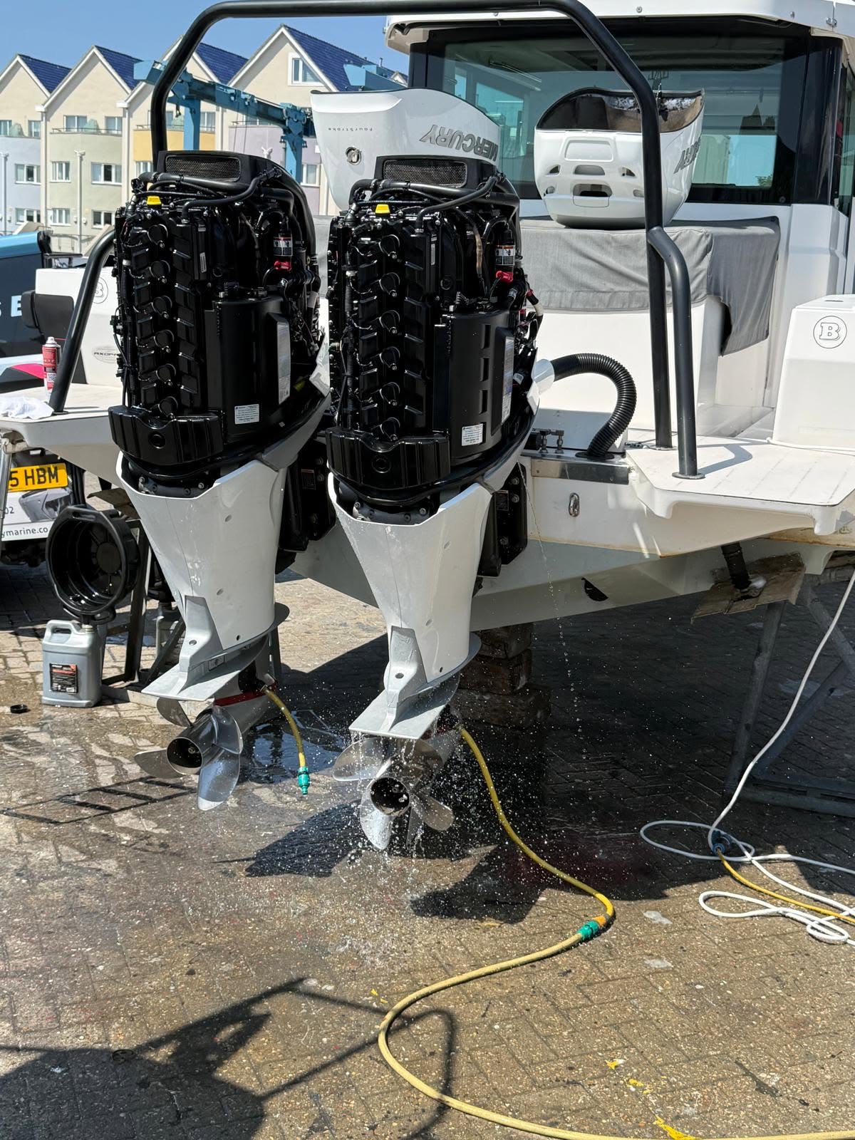 Marine engineer testing a boat battery and electrical system in Poole
